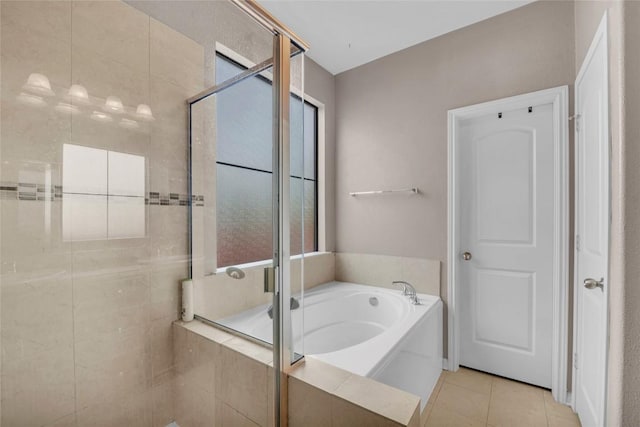 3306 Castleton Dr, Killeen, TX 76542 - bathroom featuring a garden tub, a stall shower, and tile patterned floors
