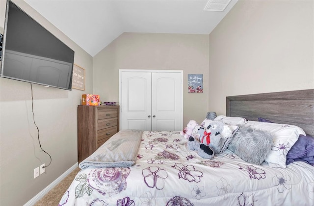 3306 Castleton Dr, Killeen, TX 76542 - carpeted bedroom featuring baseboards, visible vents, a closet, and vaulted ceiling