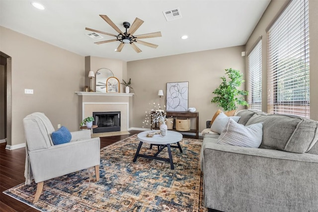 3306 Castleton Dr, Killeen, TX 76542 - living area with ceiling fan, wood finished floors, a fireplace with flush hearth, and recessed lighting