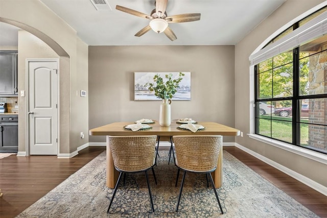 3306 Castleton Dr, Killeen, TX 76542 - dining area with arched walkways, dark wood finished floors, and ceiling fan