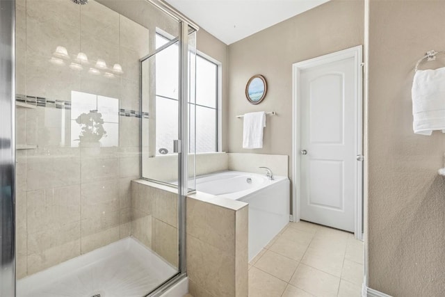 3306 Castleton Dr, Killeen, TX 76542 - bathroom featuring a stall shower, a garden tub, and tile patterned flooring