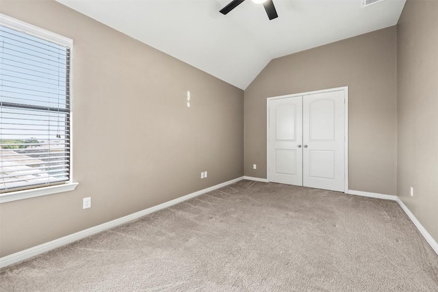 3306 Castleton Dr, Killeen, TX 76542 - unfurnished bedroom with multiple windows, carpet flooring, a closet, and lofted ceiling