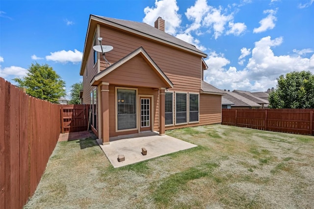 3306 Castleton Dr, Killeen, TX 76542 - rear view of property featuring a fenced backyard, a chimney, a patio, and a gate