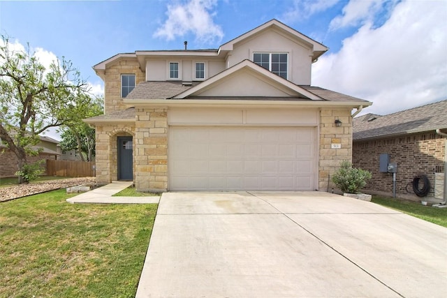 traditional-style home with a front yard, an attached garage, stone siding, concrete driveway, and stucco siding