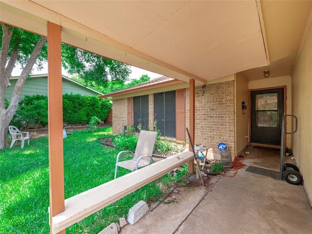 view of patio / terrace with a sunroom
