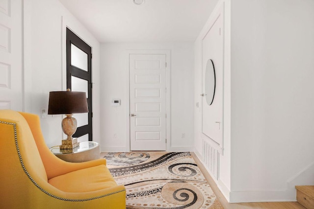 interior space featuring baseboards