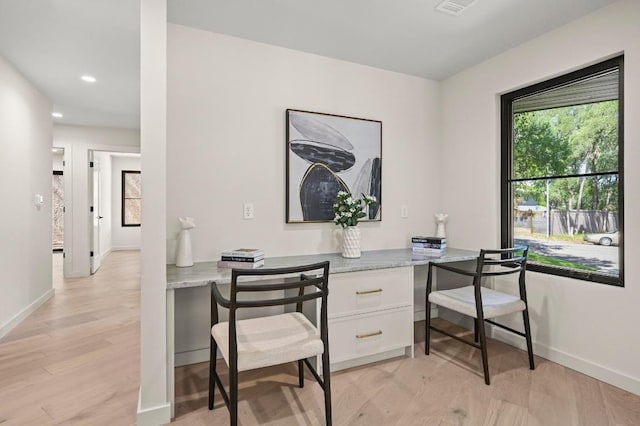 2001 Circle Hvn, Austin, TX 78741 - office featuring light wood-type flooring, baseboards, and recessed lighting