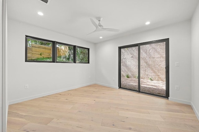 2001 Circle Hvn, Austin, TX 78741 - empty room with recessed lighting, light wood-style floors, ceiling fan, and baseboards