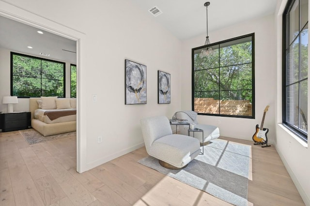 2001 Circle Hvn, Austin, TX 78741 - living area with light wood-style flooring and baseboards