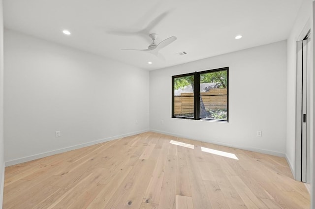 2001 Circle Hvn, Austin, TX 78741 - spare room featuring light wood-type flooring, recessed lighting, ceiling fan, and baseboards