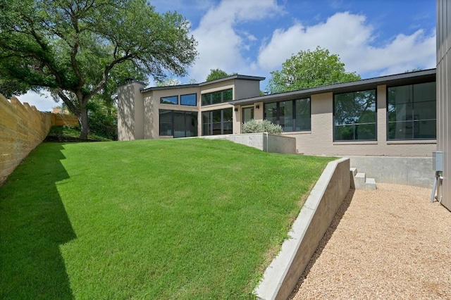 2001 Circle Hvn, Austin, TX 78741 - rear view of house with a sunroom
