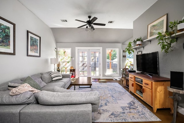 3011 Foxton Cv, Austin, TX 78748 - living area featuring lofted ceiling, ceiling fan, french doors, and dark wood-style floors