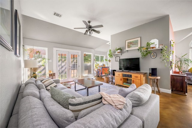3011 Foxton Cv, Austin, TX 78748 - living area with french doors, a ceiling fan, lofted ceiling, concrete flooring, and baseboards