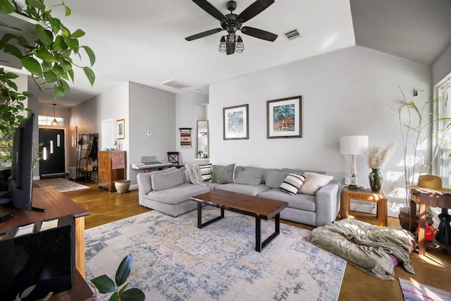3011 Foxton Cv, Austin, TX 78748 - living area with ceiling fan, wood finished floors, and lofted ceiling