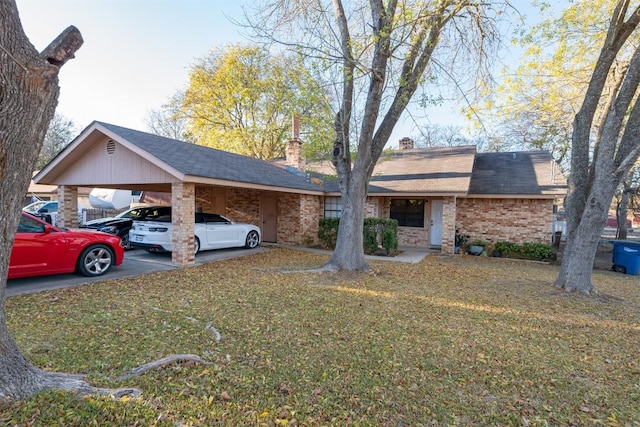 724 Woodcrest Cir, New Braunfels, TX 78130 - view of front of home featuring brick siding, a front yard, and roof with shingles