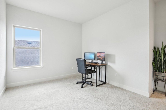 office space with baseboards and carpet