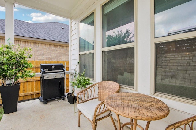 exterior space with a grill