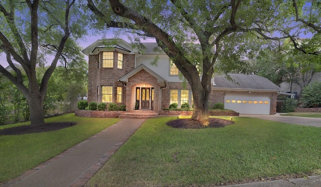1702 Crested Butte Dr, Austin, TX 78746 - traditional-style home featuring brick siding, concrete driveway, an attached garage, and a front lawn