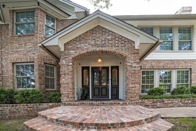 1702 Crested Butte Dr, Austin, TX 78746 - doorway to property with brick siding