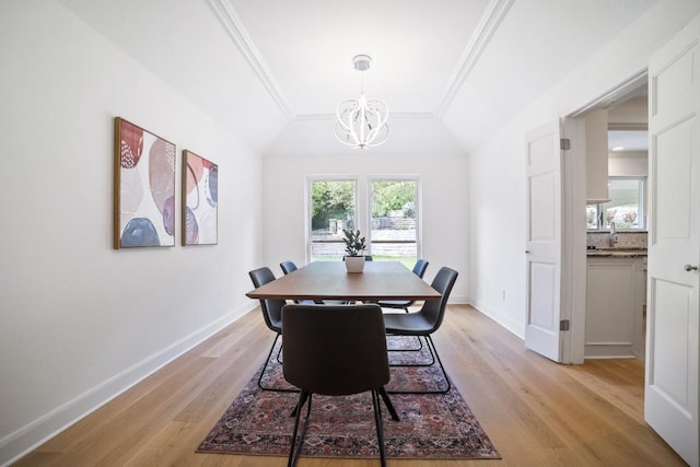 1702 Crested Butte Dr, Austin, TX 78746 - dining area featuring a chandelier, light wood-style floors, and ornamental molding