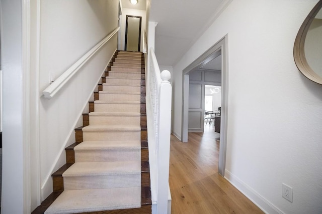 1702 Crested Butte Dr, Austin, TX 78746 - stairs featuring baseboards and wood finished floors