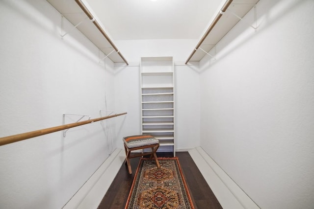 1702 Crested Butte Dr, Austin, TX 78746 - walk in closet featuring dark wood finished floors
