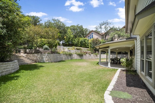 1702 Crested Butte Dr, Austin, TX 78746 - view of grassy yard with a patio