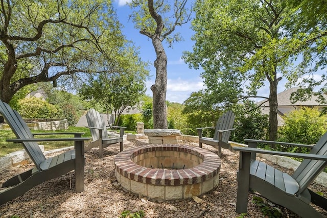 1702 Crested Butte Dr, Austin, TX 78746 - view of yard featuring an outdoor fire pit
