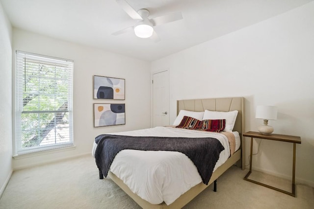 1702 Crested Butte Dr, Austin, TX 78746 - bedroom featuring carpet floors and a ceiling fan