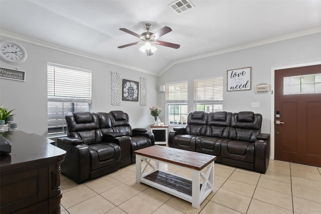 living room featuring light tile patterned floors, a ceiling fan, visible vents, ornamental molding, and lofted ceiling