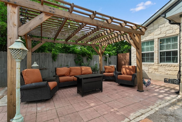 view of patio featuring an outdoor hangout area, a fenced backyard, and a pergola