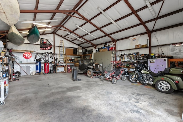 garage with a workshop area