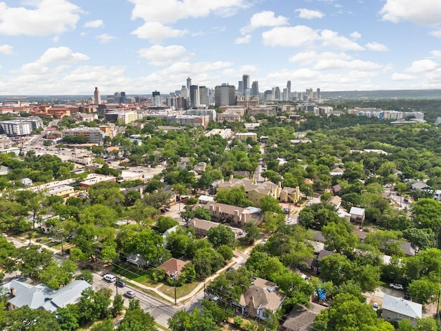 birds eye view of property featuring a view of city