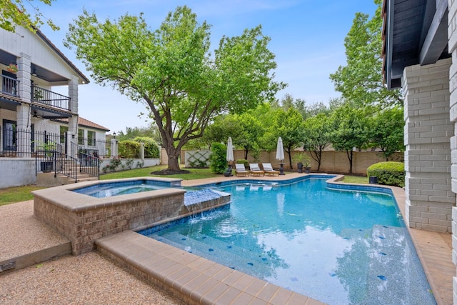 129 The Hills Dr, The Hills, TX 78738 - view of pool with a fenced backyard, an in-ground hot tub, and a ceiling fan