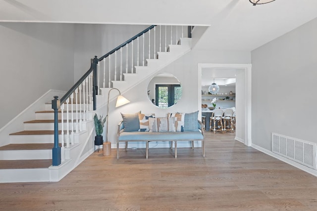 129 The Hills Dr, The Hills, TX 78738 - staircase with wood finished floors and baseboards