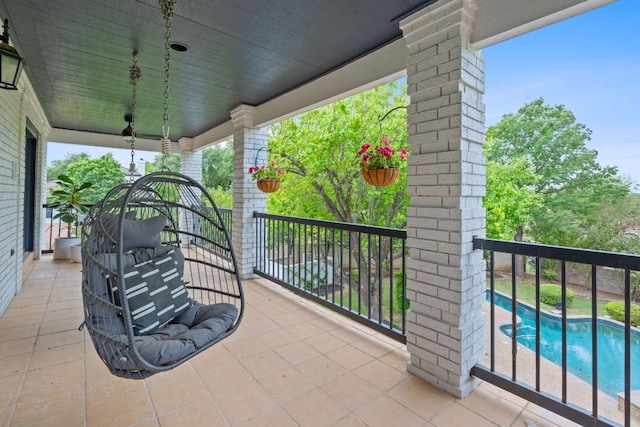 129 The Hills Dr, The Hills, TX 78738 - view of patio / terrace with a balcony