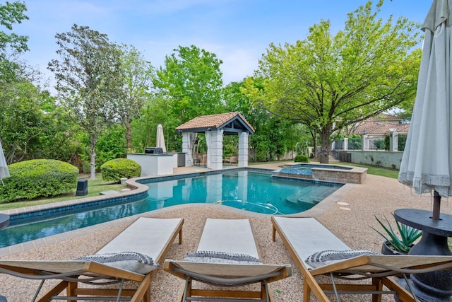 129 The Hills Dr, The Hills, TX 78738 - view of swimming pool featuring a gazebo, a patio, a pool with connected hot tub, and view of wooded area