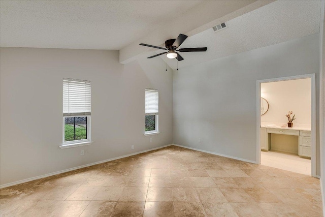 unfurnished bedroom with visible vents, ensuite bath, vaulted ceiling, and baseboards