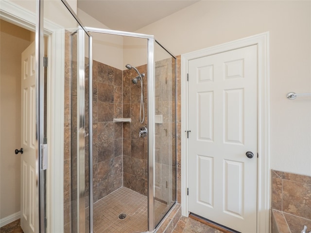 2912 Norton Ave, Lago Vista, TX 78645 - bathroom featuring a stall shower