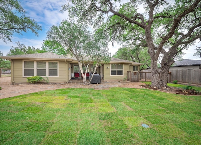 2912 Norton Ave, Lago Vista, TX 78645 - rear view of property with a patio area