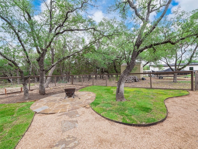 2912 Norton Ave, Lago Vista, TX 78645 - view of yard with a patio and an outdoor fire pit