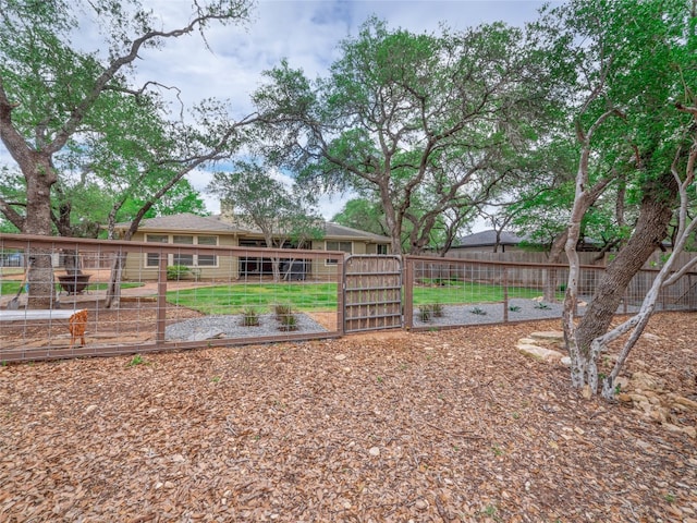 2912 Norton Ave, Lago Vista, TX 78645 - fenced yard with a gate