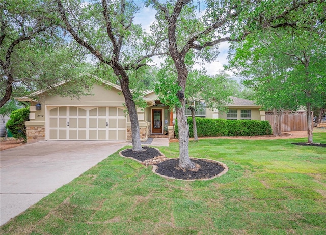 2912 Norton Ave, Lago Vista, TX 78645 - ranch-style home featuring an attached garage, concrete driveway, a front lawn, and stucco siding