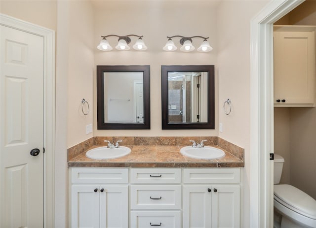 2912 Norton Ave, Lago Vista, TX 78645 - full bathroom featuring double vanity and toilet