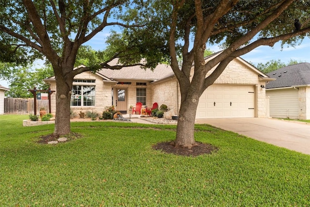 30310 Bumble Bee Dr, Georgetown, TX 78628 - ranch-style house with a garage, fence, a front yard, stone siding, and concrete driveway