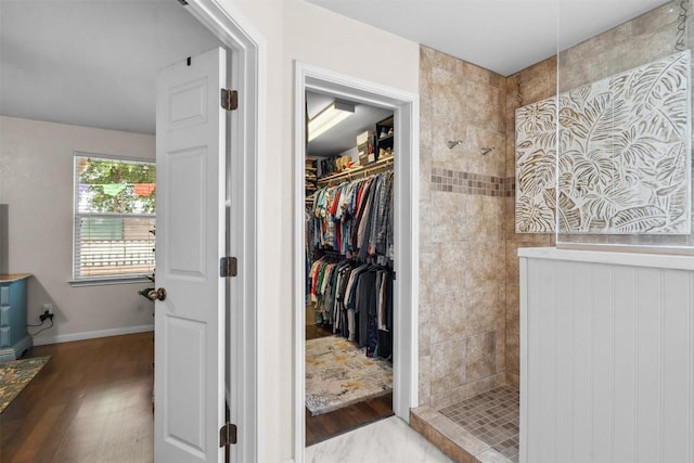 30310 Bumble Bee Dr, Georgetown, TX 78628 - interior space featuring walk in shower, wood finished floors, and a spacious closet