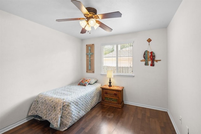 30310 Bumble Bee Dr, Georgetown, TX 78628 - bedroom with baseboards, ceiling fan, and wood finished floors