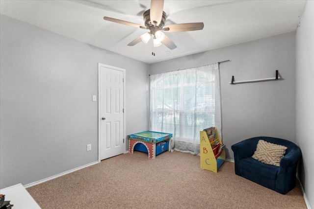 107 Jefferson Cv, Elgin, TX 78621 - game room featuring baseboards, ceiling fan, and carpet