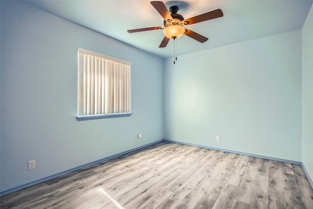 8201 Georgie Trace Ave, Austin, TX 78747 - empty room with ceiling fan and wood finished floors