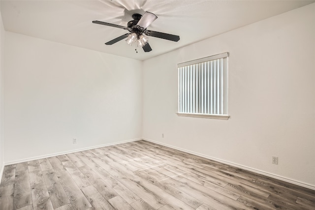 8201 Georgie Trace Ave, Austin, TX 78747 - unfurnished room featuring wood finished floors and a ceiling fan